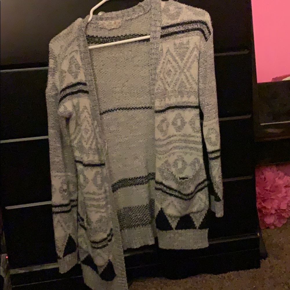 grey with tones of white and black cardigan